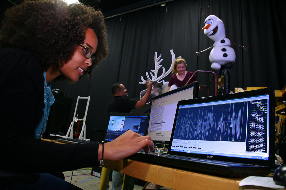 Imagineer working on Frozen animatronic figure.
