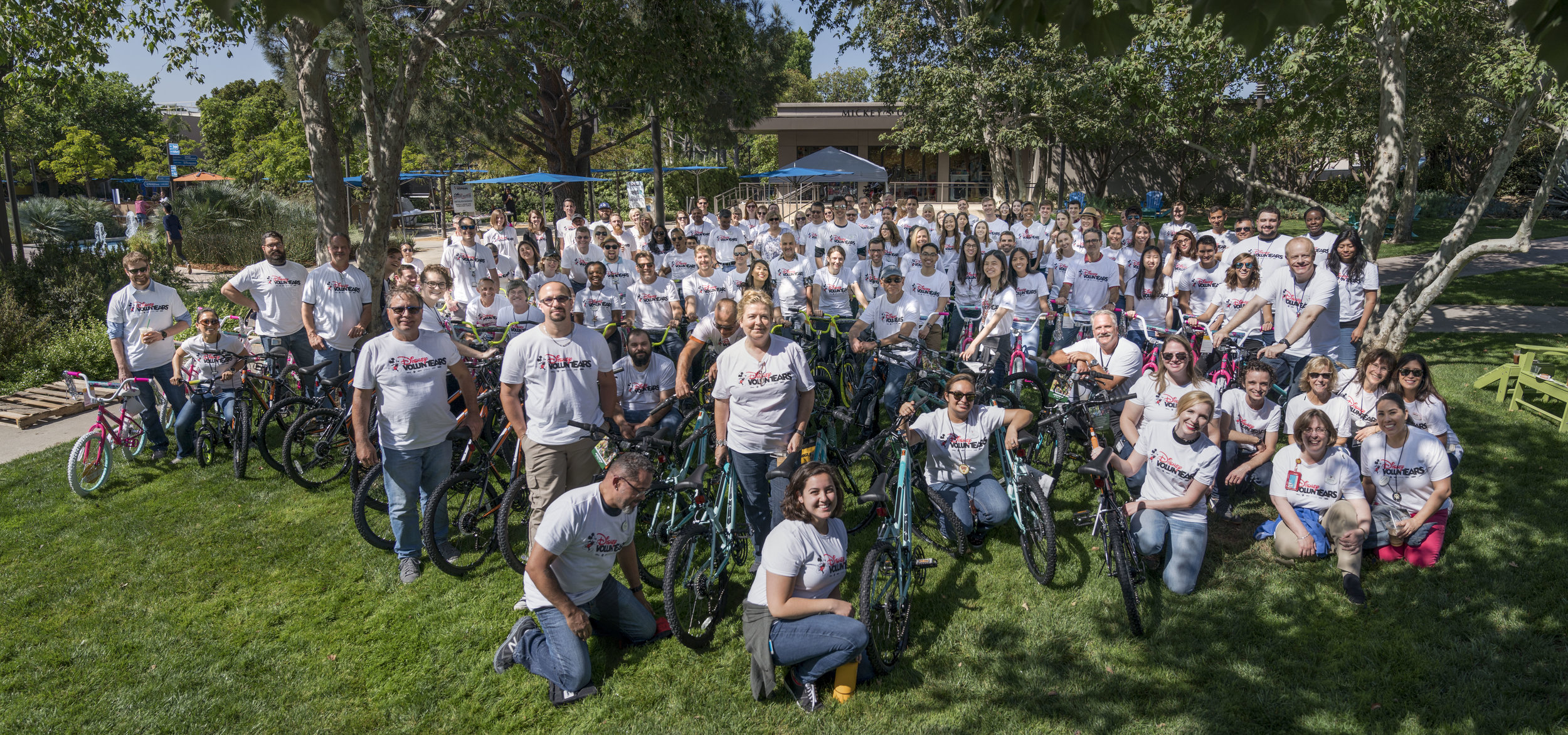 Imagineers ready for their VoluntEARS event gather on the greenspace at the Walt Disney Imagineering offices.