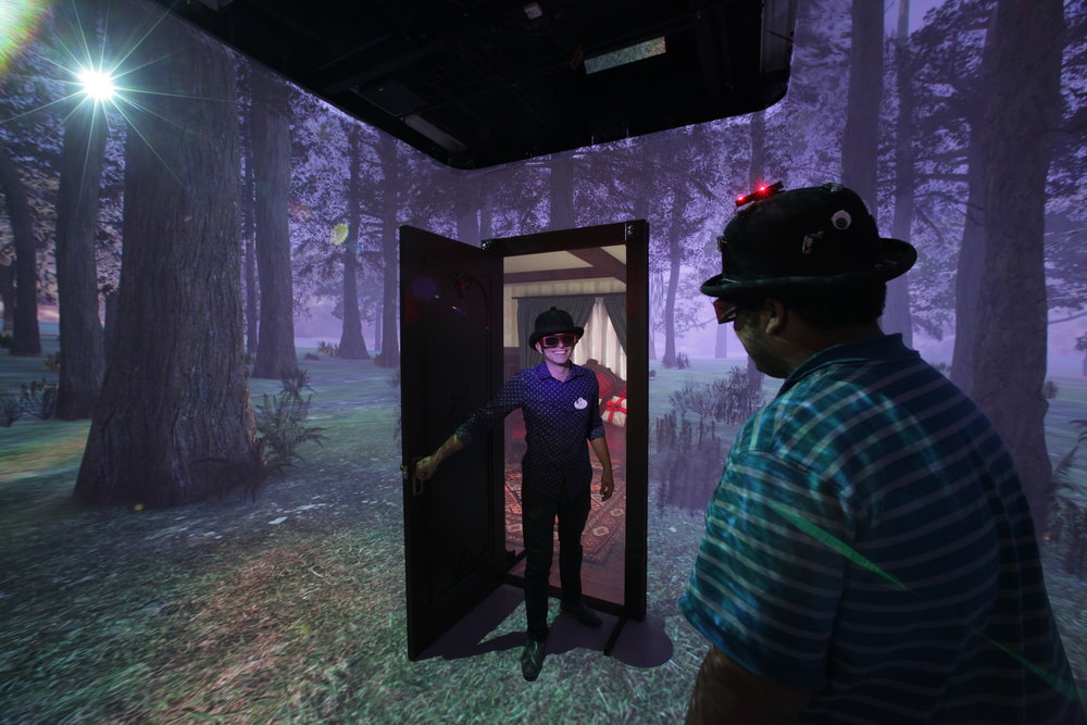Imagineers using Virtual Reality to visualize concepts in the DISH.