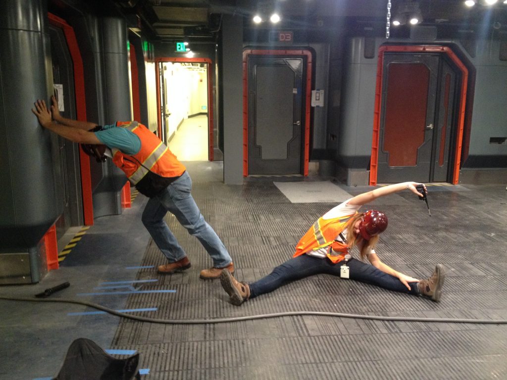 Imagineers stretching on site.