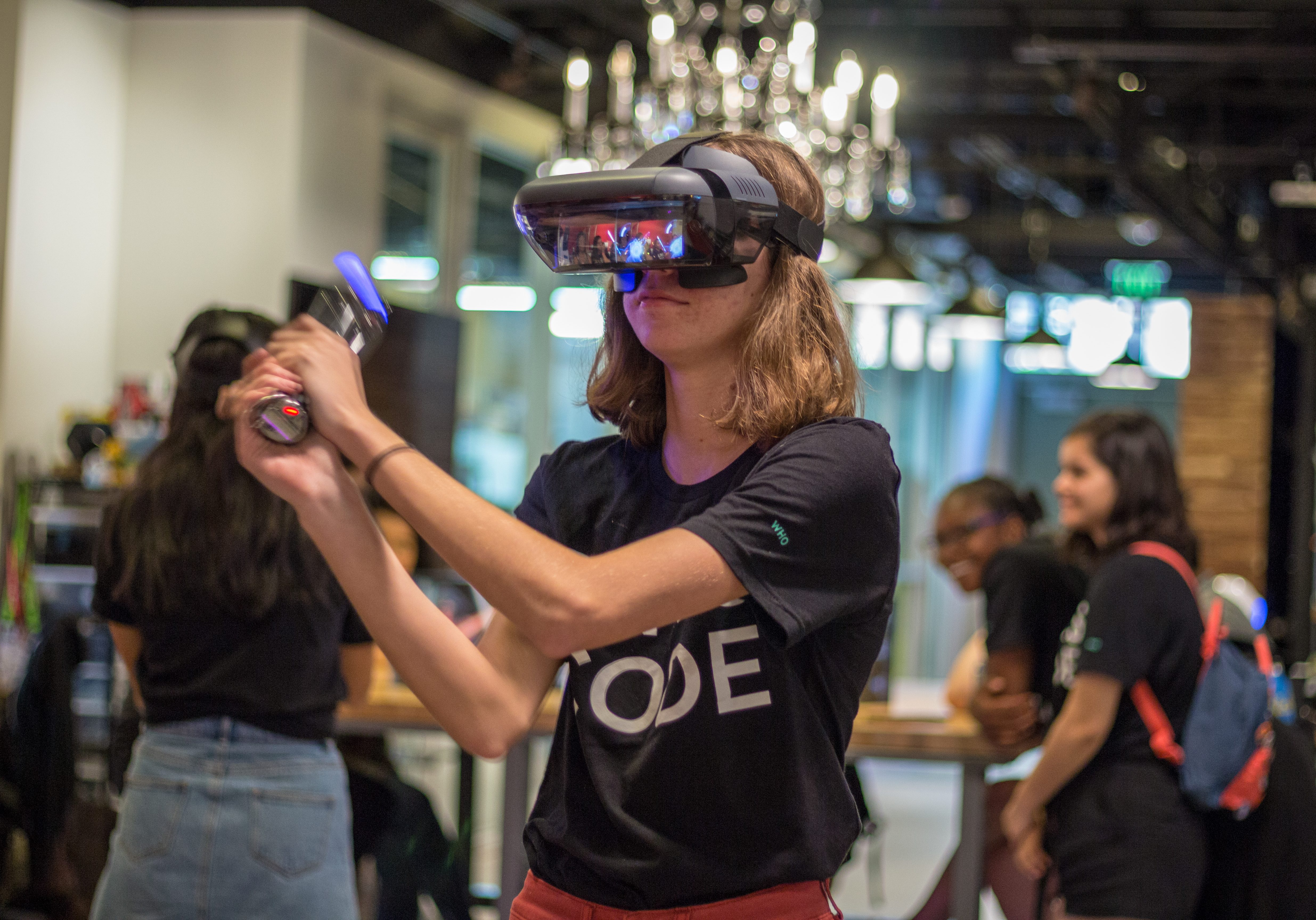Girls Who Code participant working with VR.