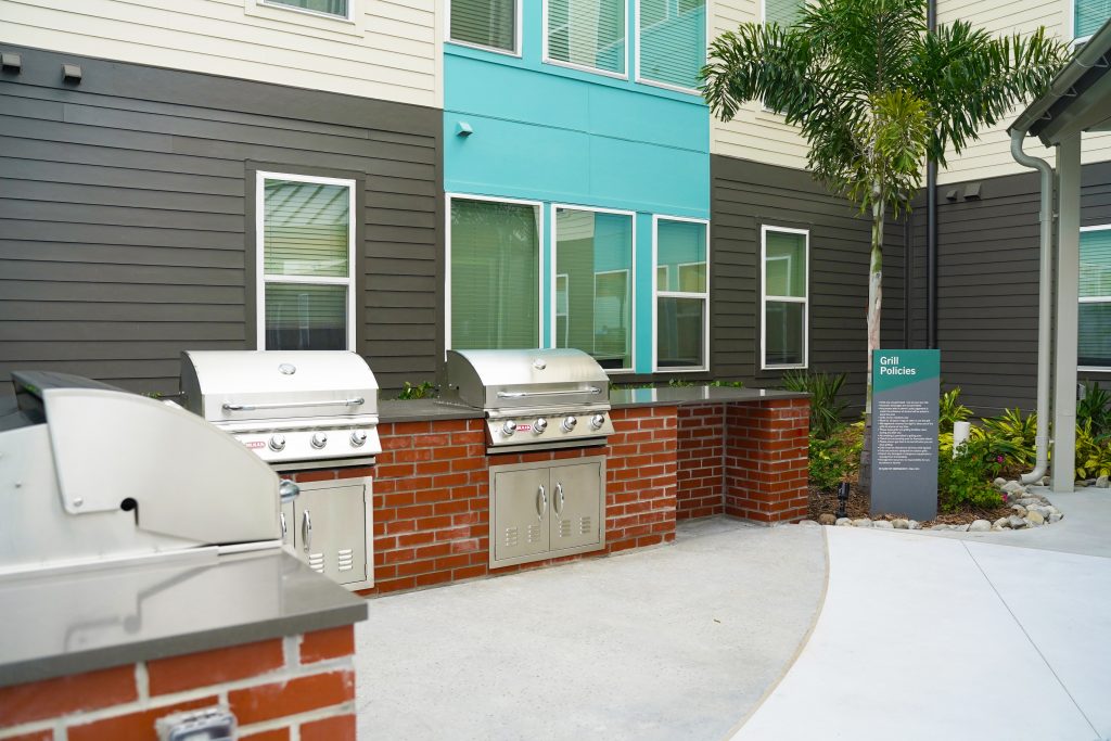 An outdoor grilling station at Flamingo Crossings Village