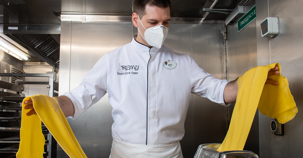 Max preparing to serve memorable meals to guests at Remy onboard the Disney Dream.
