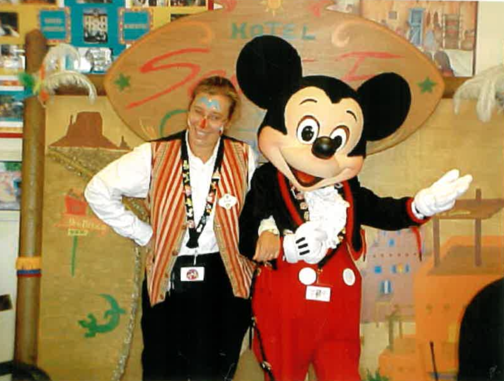 Photo of Sophie with Mickey Mouse