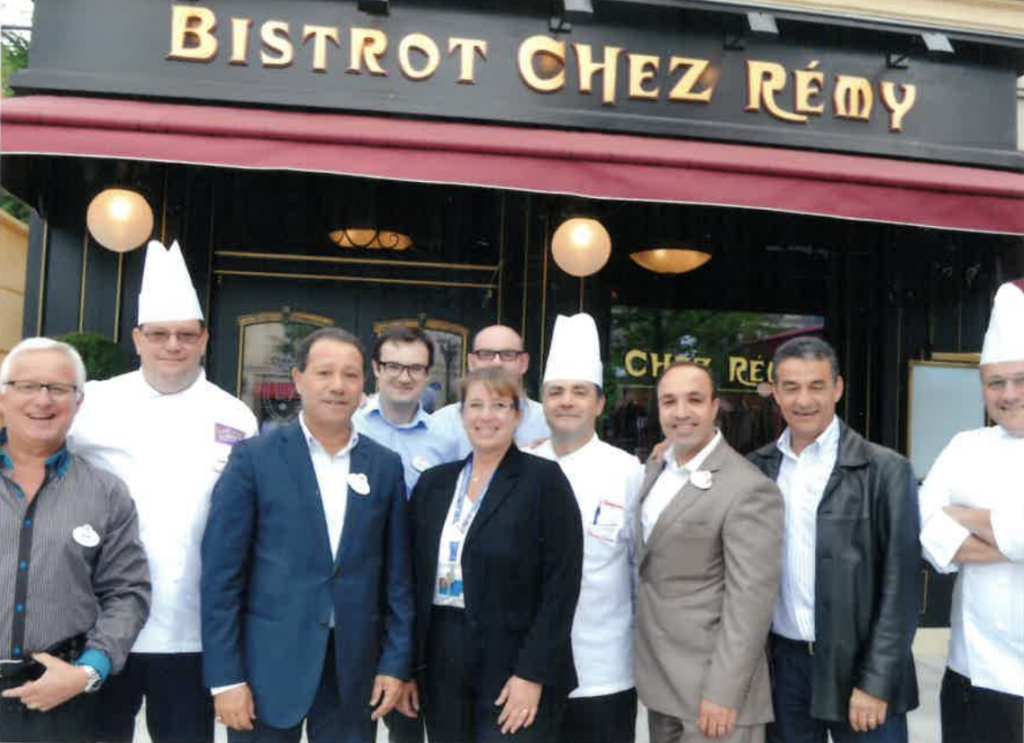 Photo of Sophie and team in front of Bistrot Chez Remy