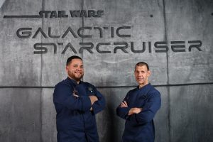 Bobby Otero and Chef Brian in front of the Star Wars Galactic Starcruiser