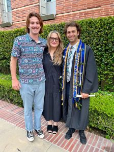 Claire with her two sons at one of their college graduations