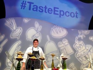 Chef Daniel Contreras at a culinary event, Text: #TasteEpcot