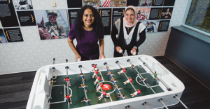 Jomana Ismail and Kruthika N.S. playing foosball