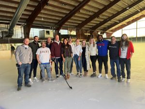 ESPN Sports Marketing team on a hockey rink