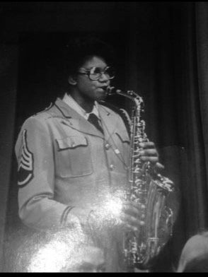 Ida playing the saxophone in high school