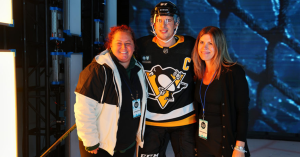 (L-R) ESPN senior associate producter Courtni Regan; Sidney Crosby of the Pittsburgh Penguins; and Storytelling & Original Content manager Megan Anderson pose. (Al Powers/ESPN Images)