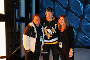 (L-R) ESPN senior associate producter Courtni Regan; Sidney Crosby of the Pittsburgh Penguins; and Storytelling & Original Content manager Megan Anderson pose. (Al Powers/ESPN Images)