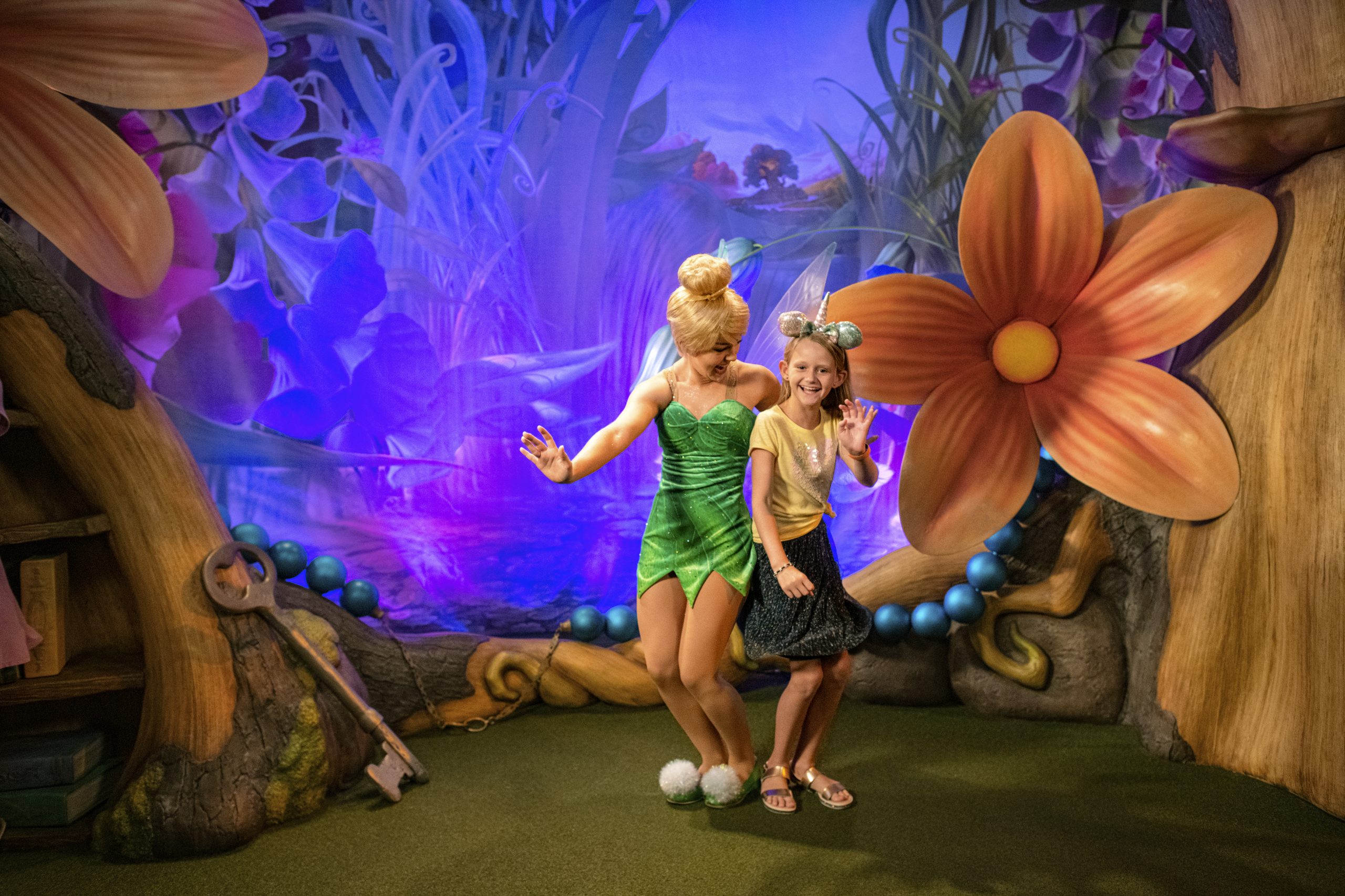 Tinkerbell and a young girl