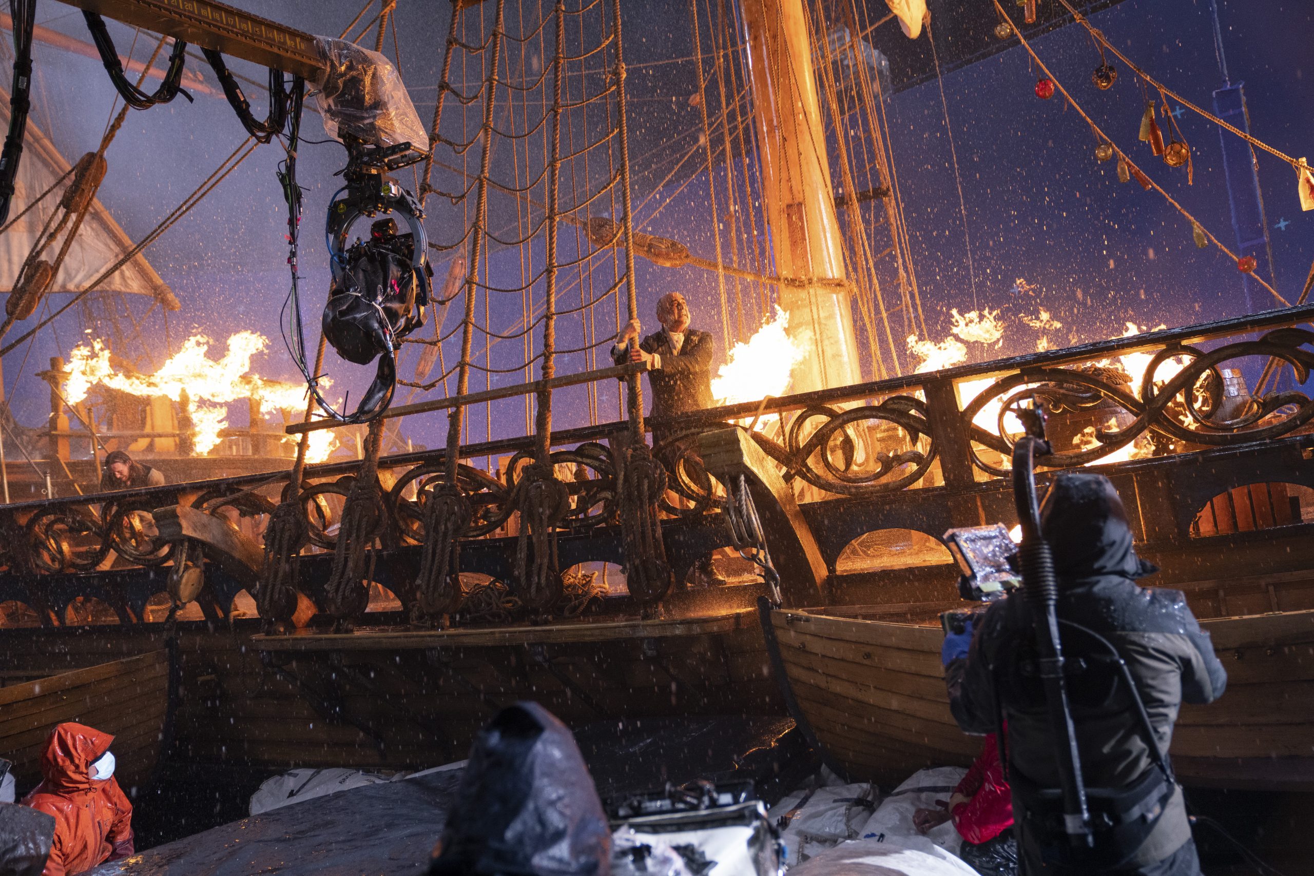 THE LITTLE MERMAID (L-R): Art Malik as Sir Grimsby and Cinematographer Dion Beebe on the set of Disney's live-action THE LITTLE MERMAID. Photo by Giles Keyte. © 2023 Disney Enterprises, Inc. All Rights Reserved.