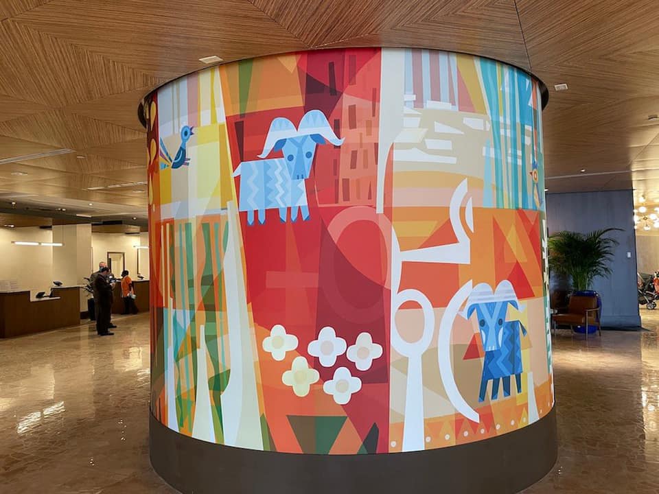 Joey Chou’s artwork for Bay Lake Tower at Disney’s Contemporary Resort builds on a style established by imagery 	he created previously for the resort’s original tower, including these striking installations in the main tower lobby.
