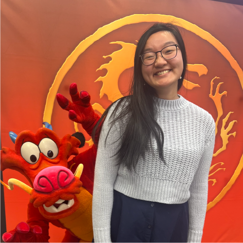 Artboard 1 Tiffeny poses with Mushu.