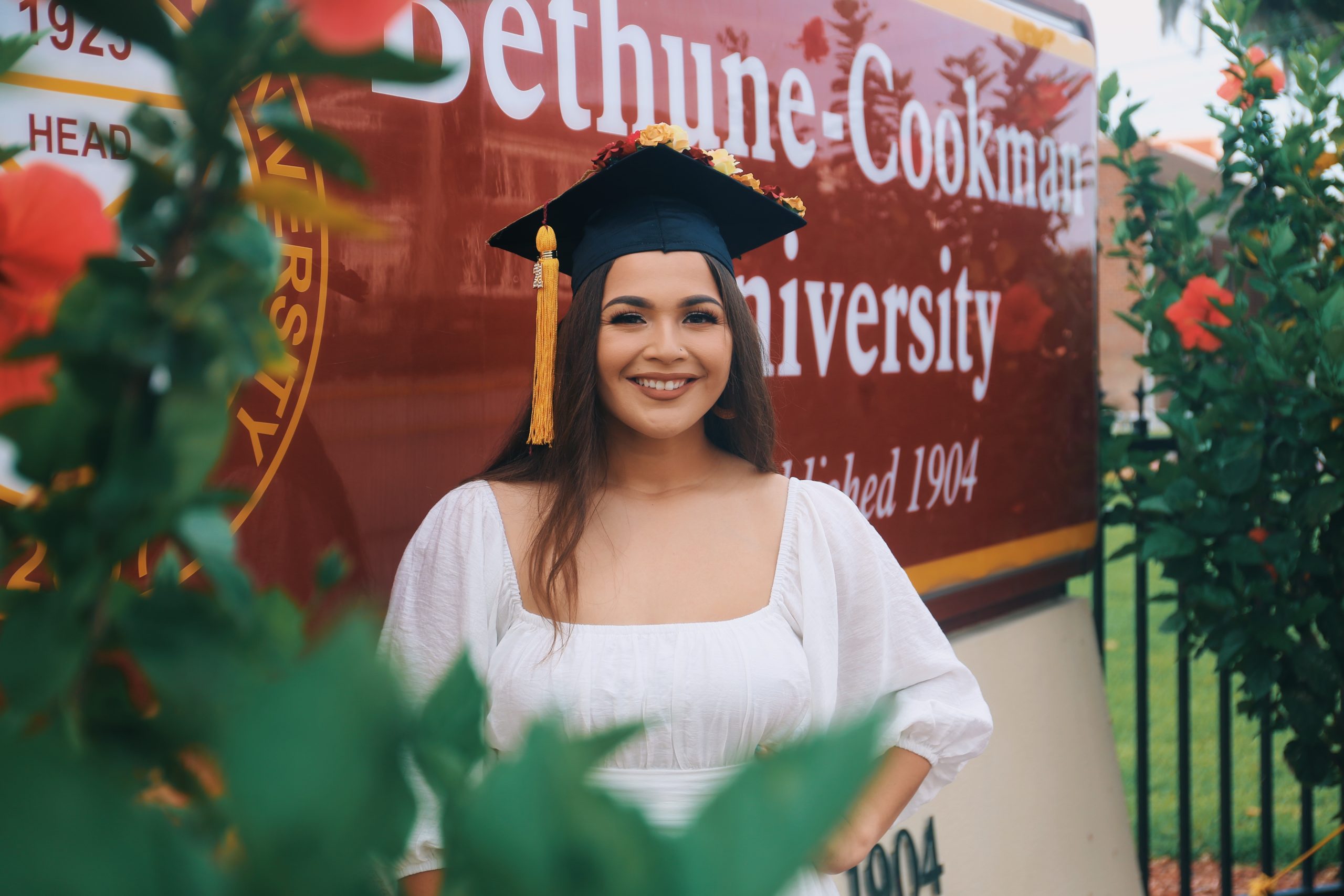 Bethune-Cookman University Alum posing at graduation