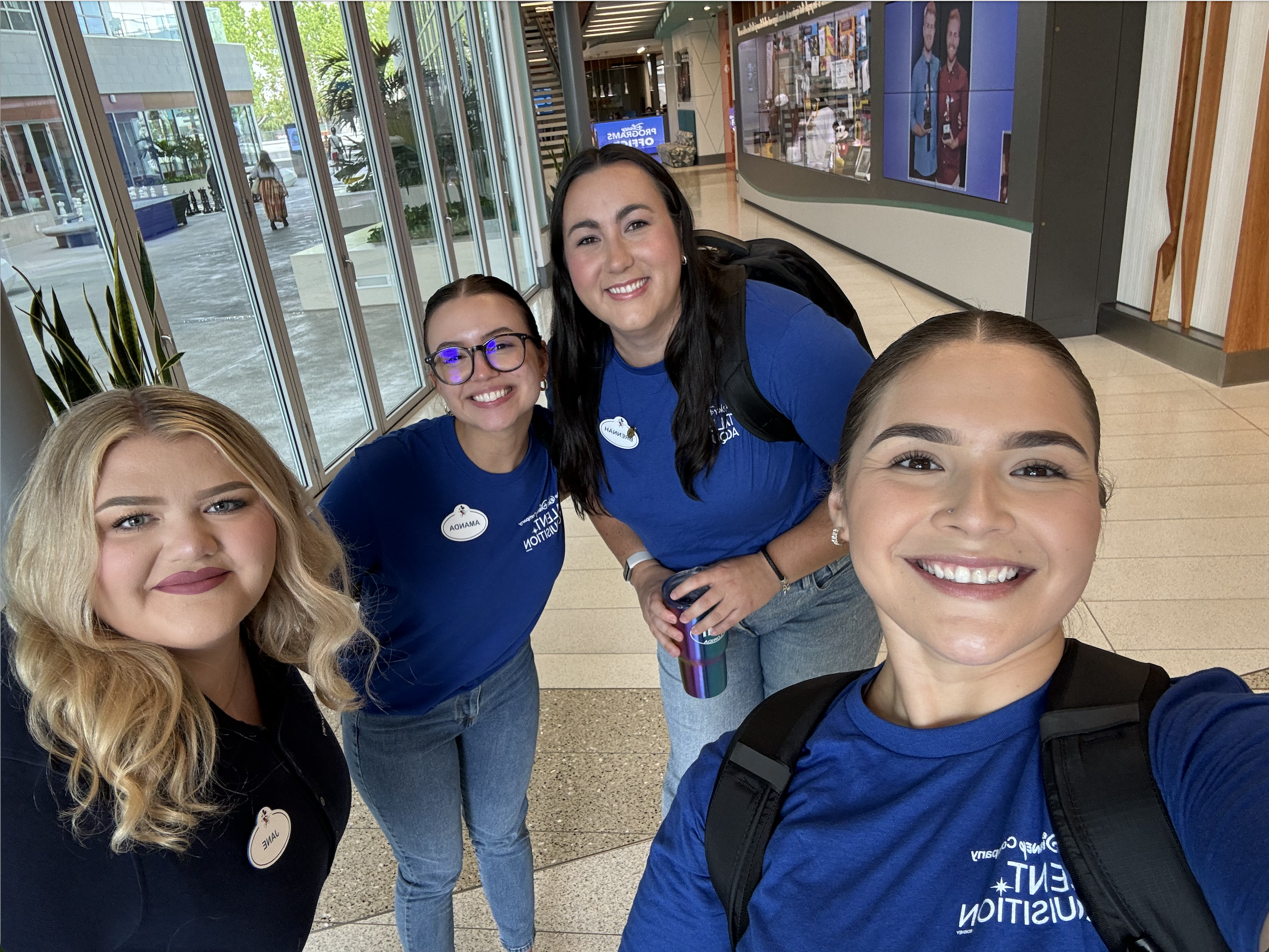 Destiny smiling with Talent Connection Marketing coworkers