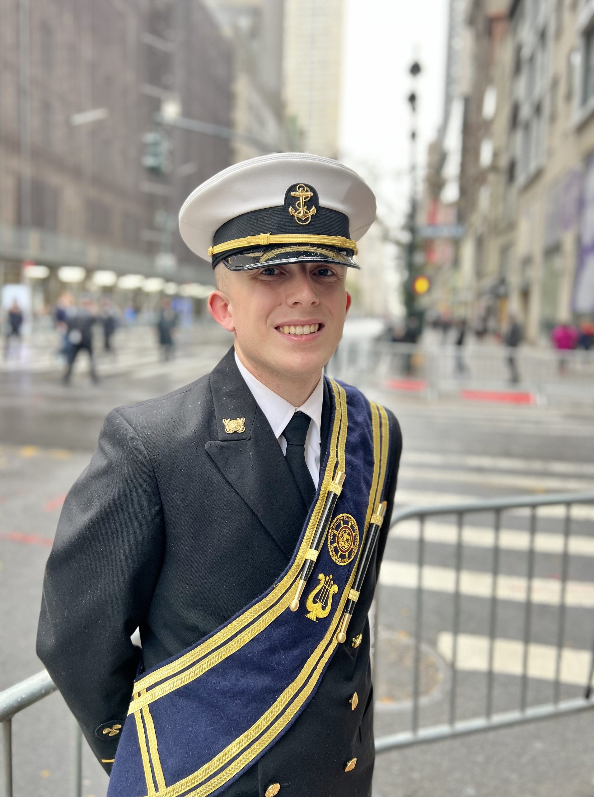 Third Engineer Daniel photographed against a cityscape.