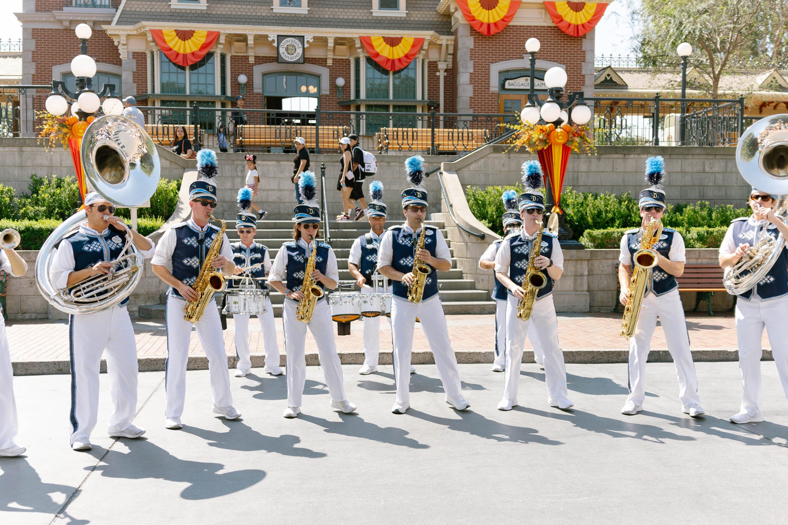 Group photo of the Disneyland Band playing on Main Street, U.S.A.