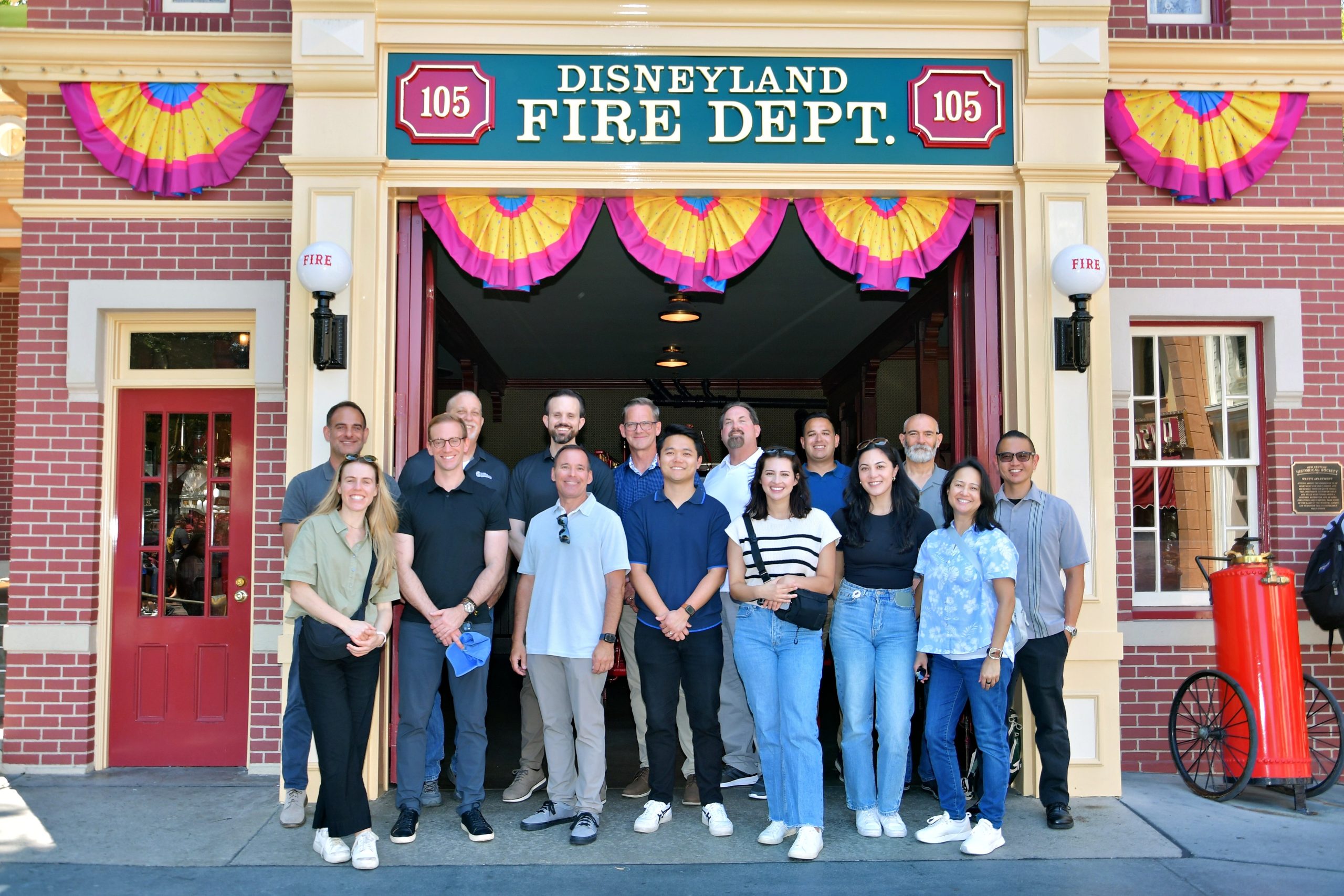 Group photo of Global Security team in front of Walt Disney World City Hall.