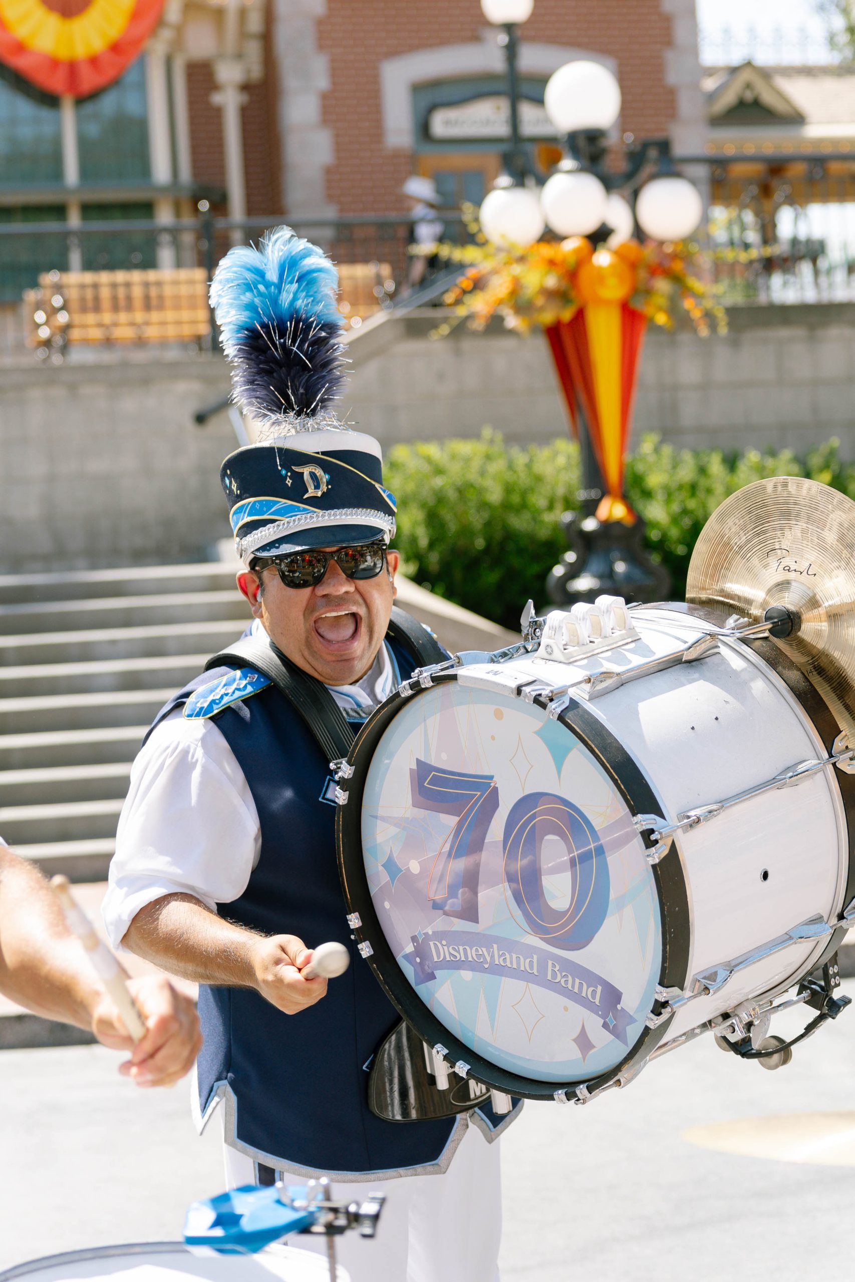 Photo of bass drum player smiling and playing