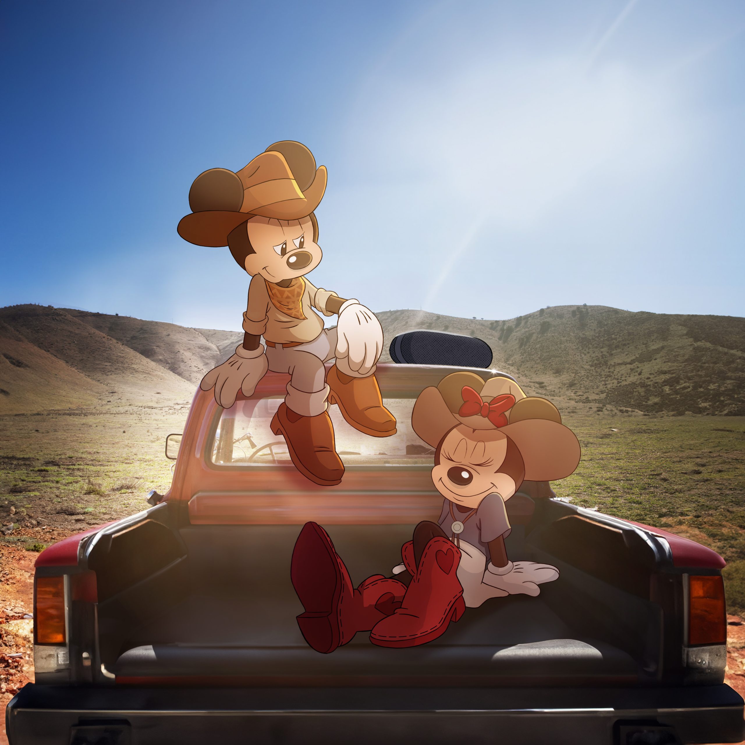 Mickey Mouse and Minnie Mouse sit on a pickup truck in a desert landscape wearing western outfits on the album artwork for Disney&rsquo;s Main Street Country EP.