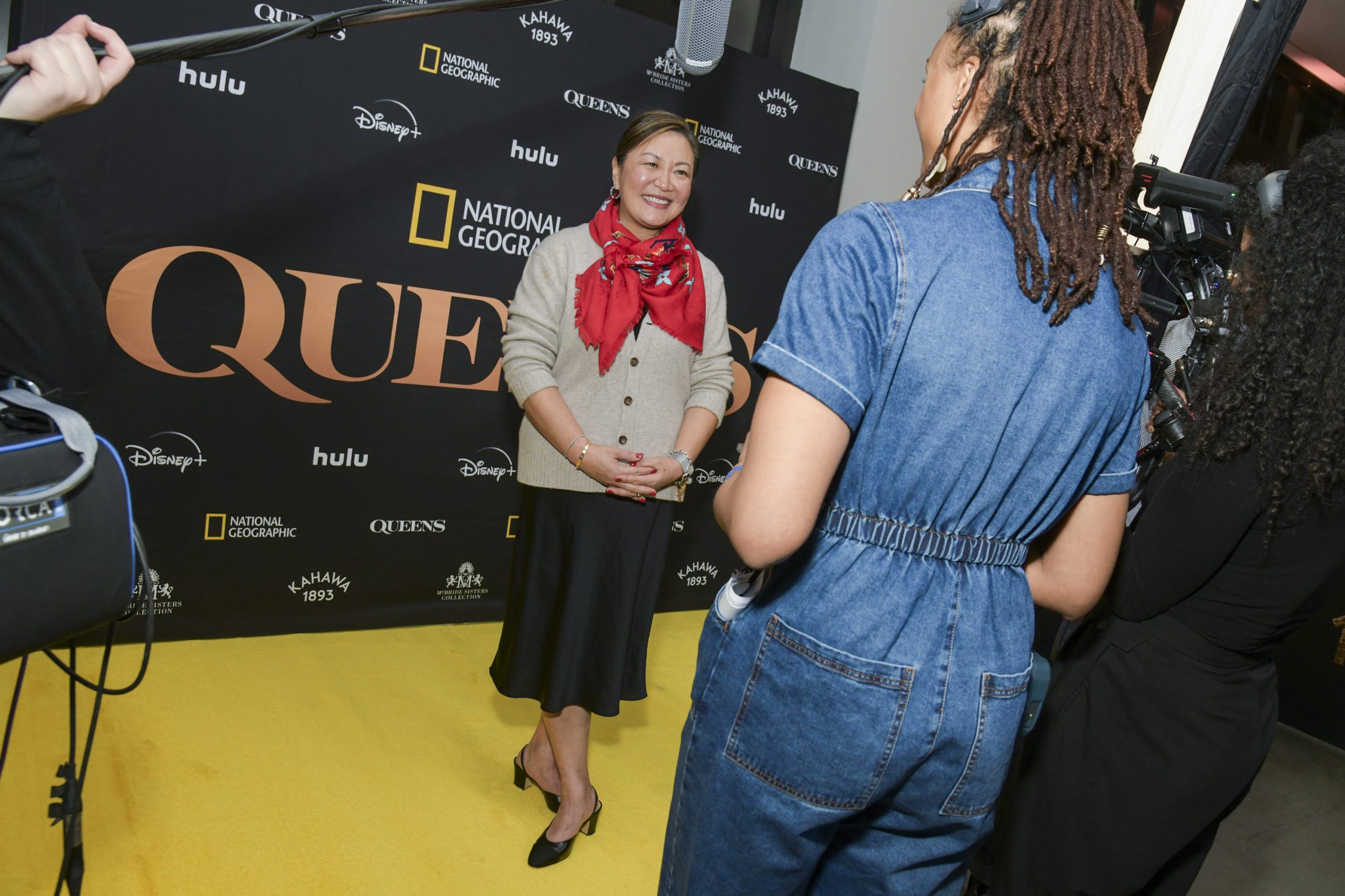 A National Geographic leader participates in a filmed interview at a premiere event, underscoring science‑driven storytelling across Disney and National Geographic platforms.