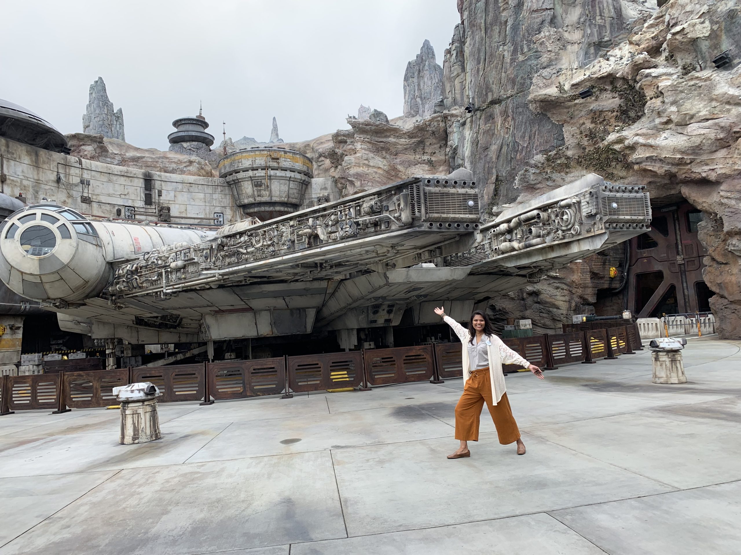 Sangita in front of the Millenium Falcon in Disneyland Resort.