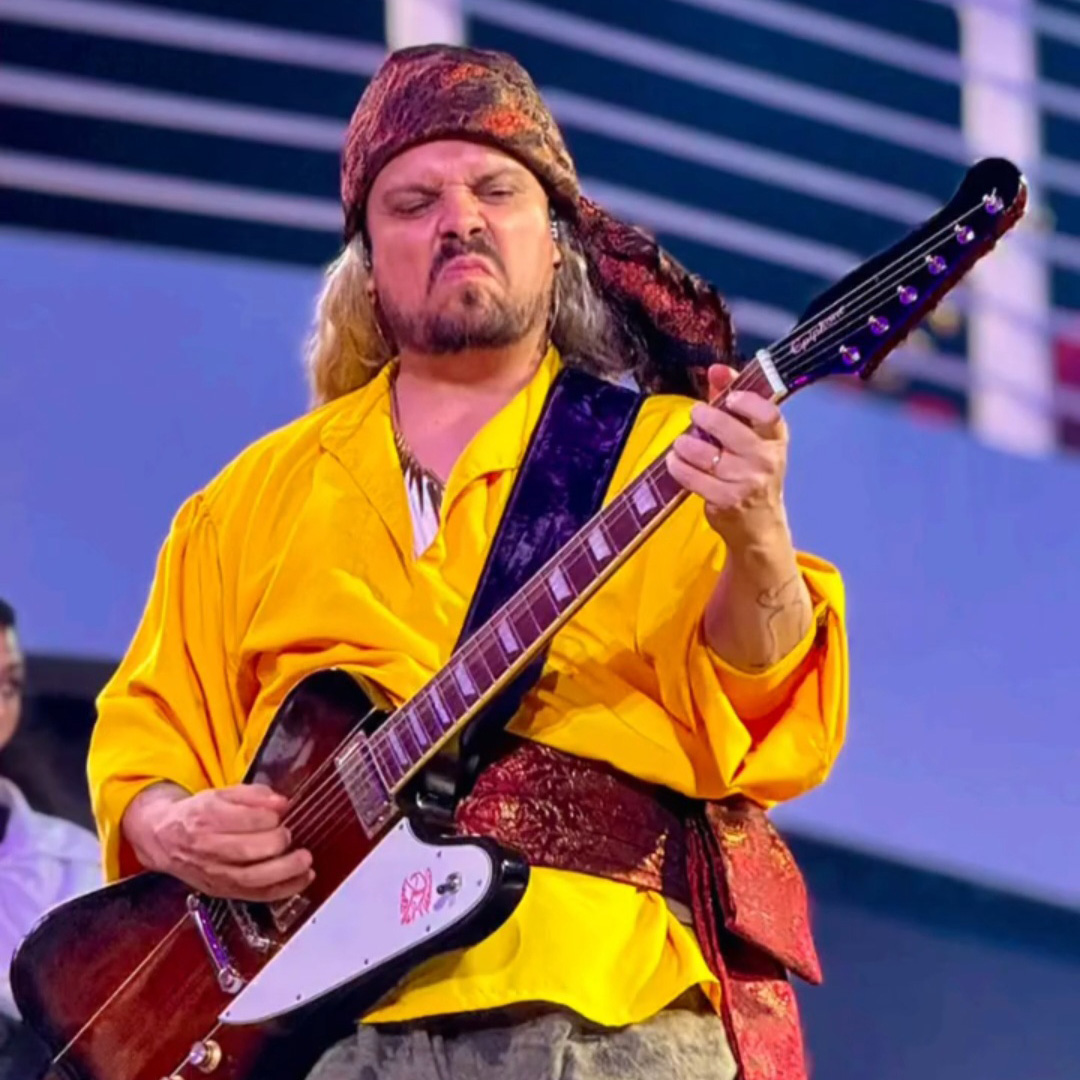 Guitarist in pirate outfit playing on Disney Cruise Line