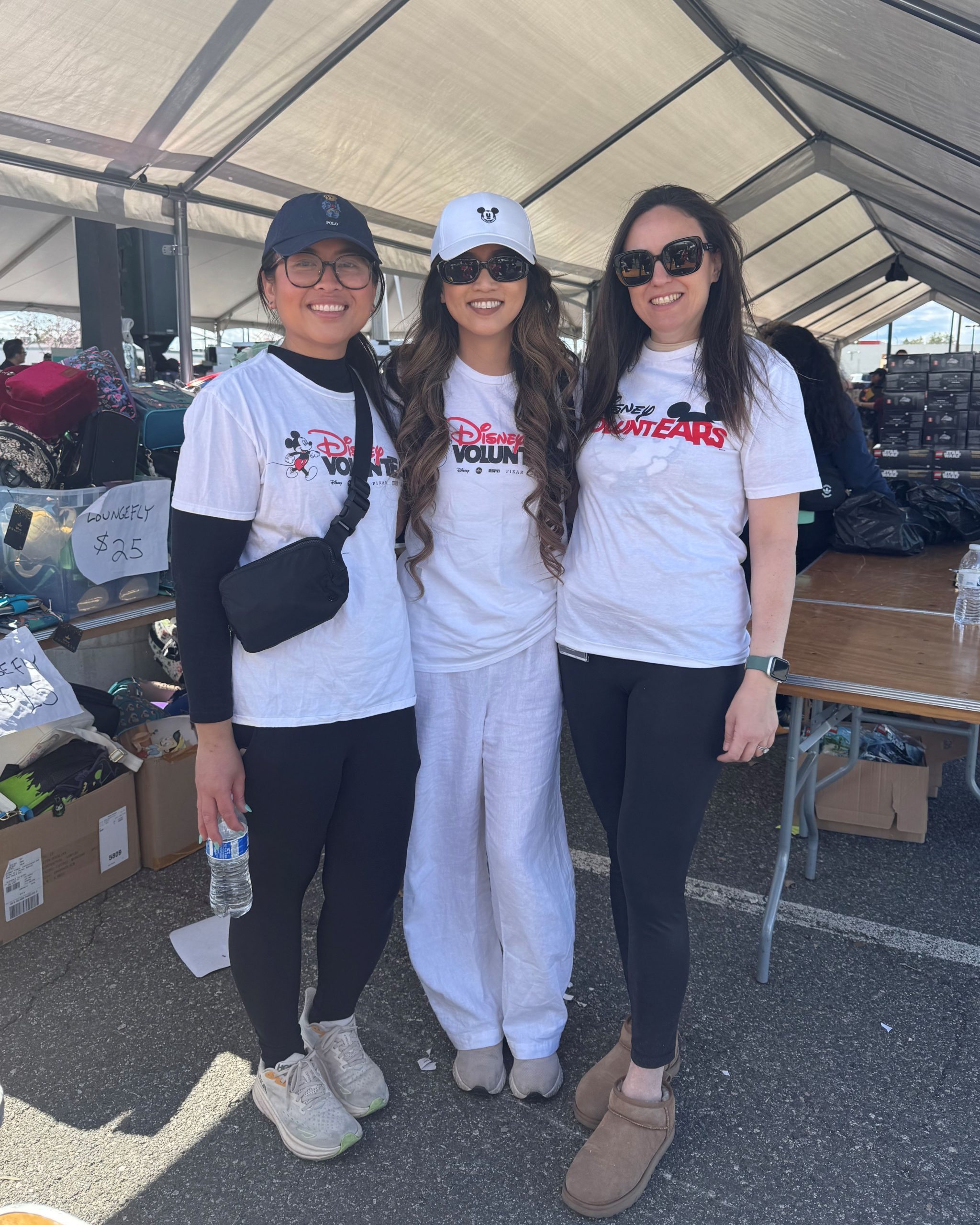 Disney recruiter Marjorie volunteers alongside fellow Disney employees at a community event, showcasing teamwork, partnership and employee engagement beyond day-to-day recruiting responsibilities.