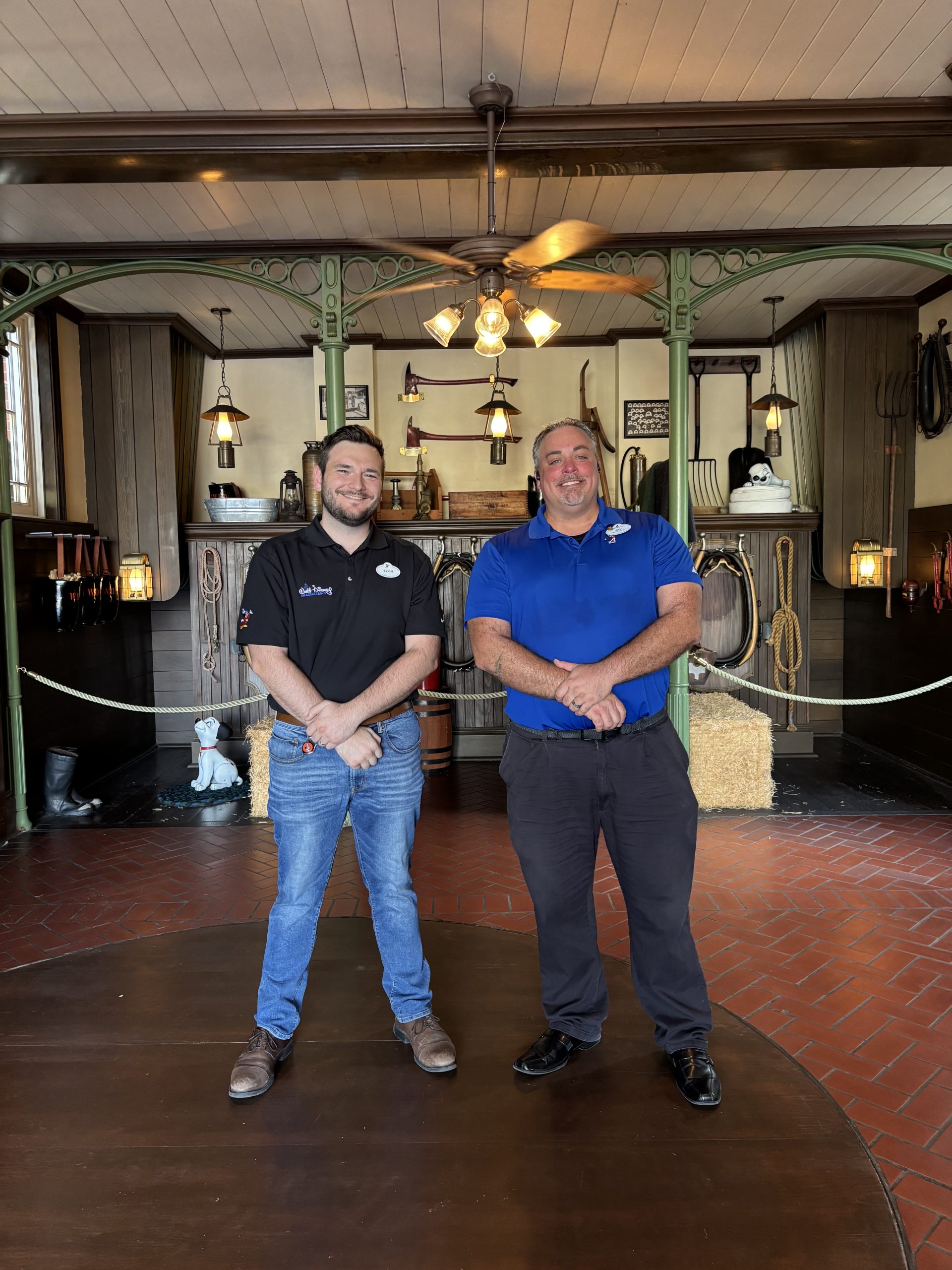 Kevin and Jay standing together in Walt Disney World fire house.