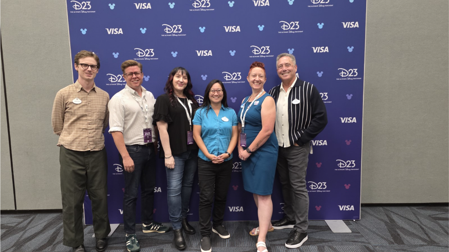 Kevin and the Disney Restoration and Library Management team pose backstage at D23: The Ultimate Disney Fan Event.