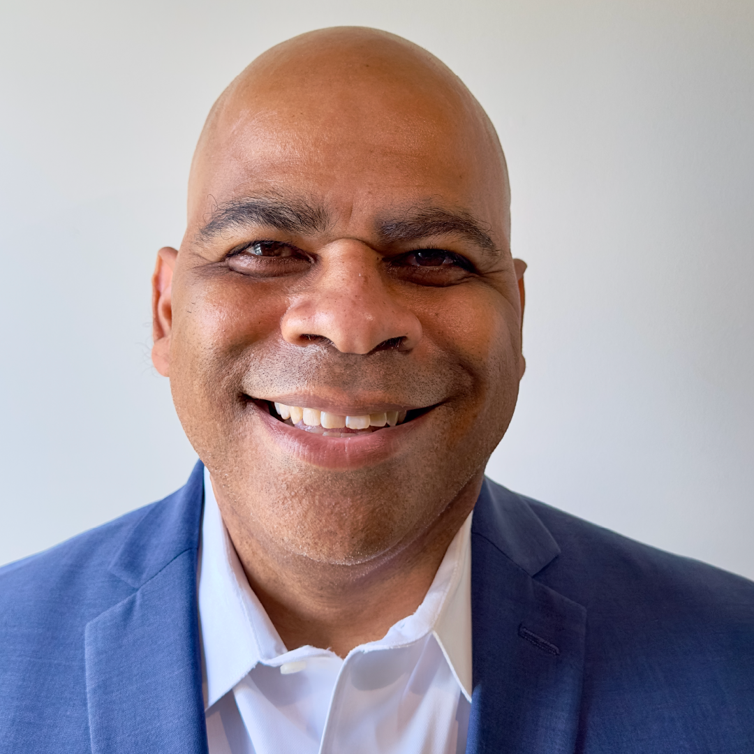 professional headshot of Rodney, Coordinating Producer at ESPN and Disney media leader attending the NABJ 2026 Convention & Career Fair. Rodney is pictured in a blue blazer against a neutral background.