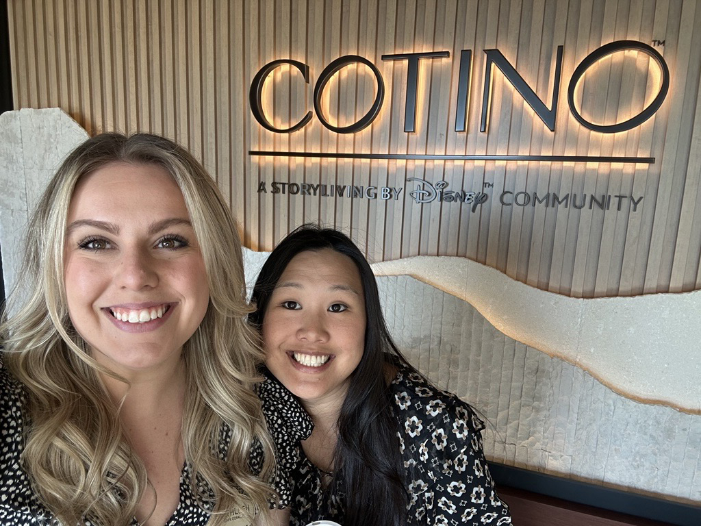 Storyliving by Disney team members pose at the Cotino community experience, highlighting the innovative lifestyle communities, immersive experiences, and career opportunities that bring Disney storytelling beyond the parks and into everyday living.