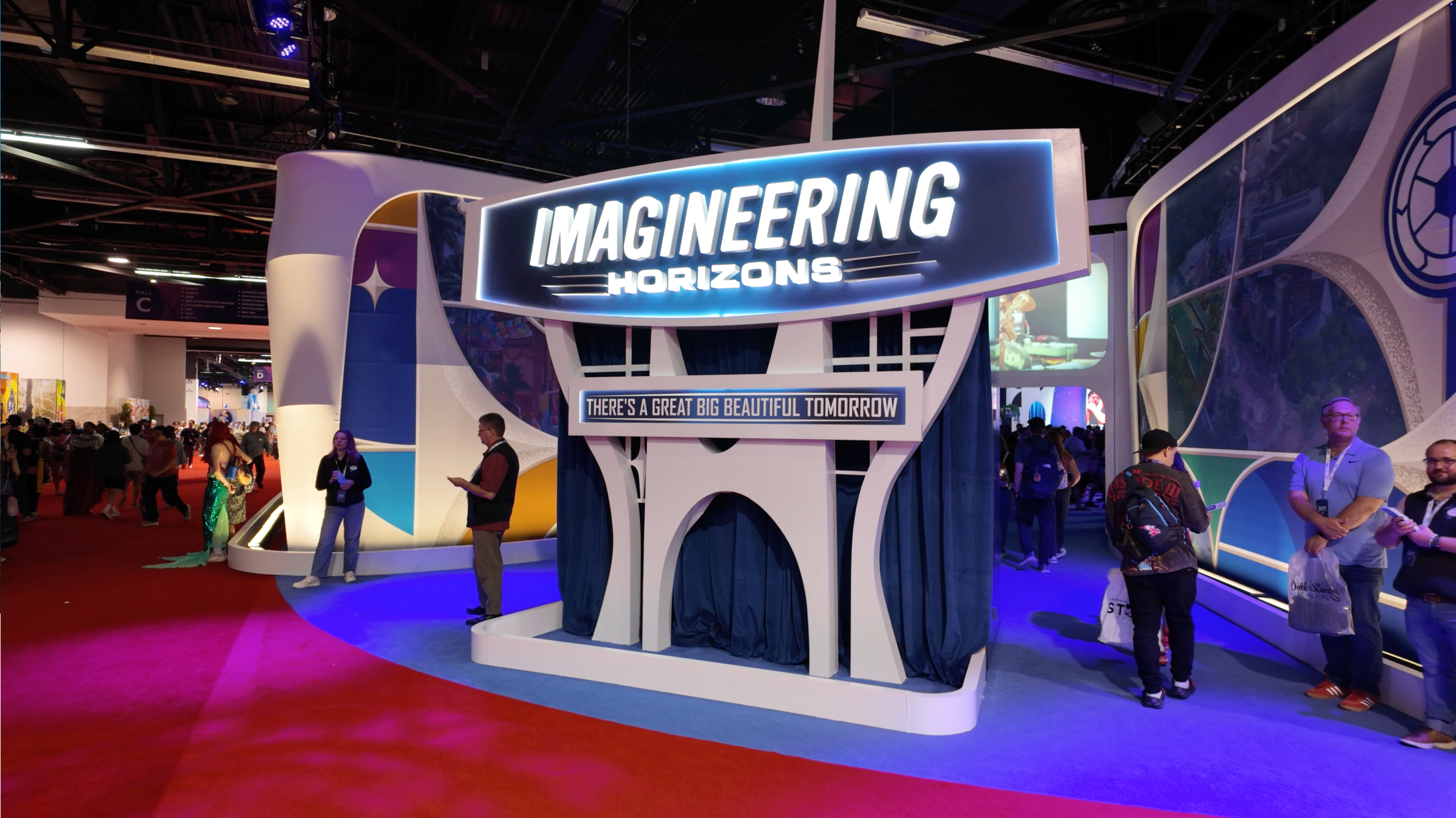 Guests explore the Walt Disney Imagineering Horizons exhibit at D23: The Ultimate Disney Fan Event, showcasing Disney Imagineering innovation, themed design, and the creative careers that bring Disney experiences to life.