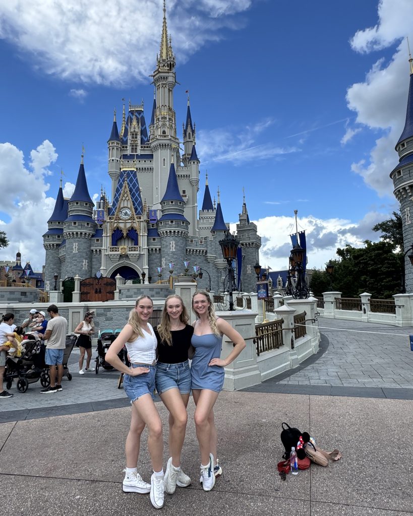 Jessica, Kelly and Chloe together in front of Cinderella Castle at Walt Disney World Resort.