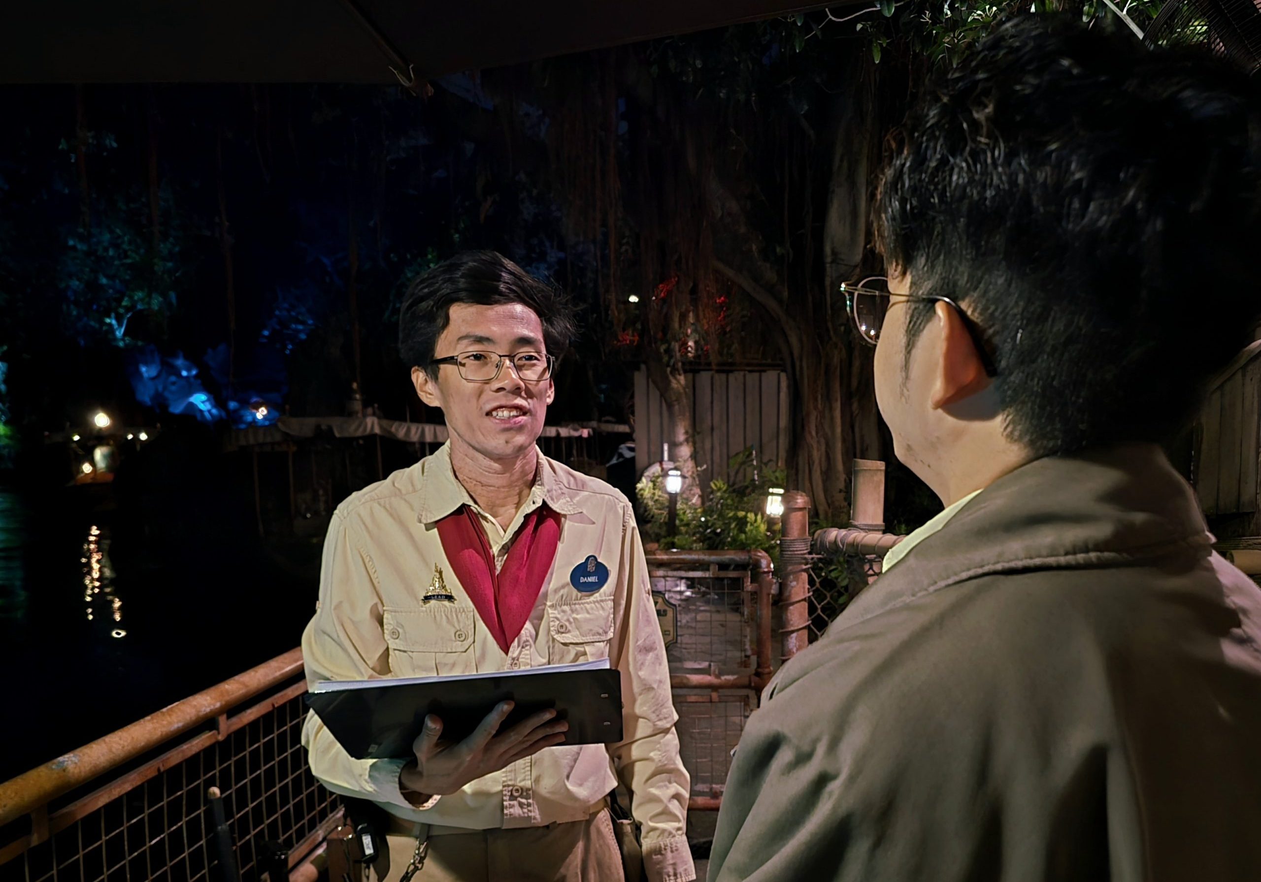 Image of employee speaking to a guest