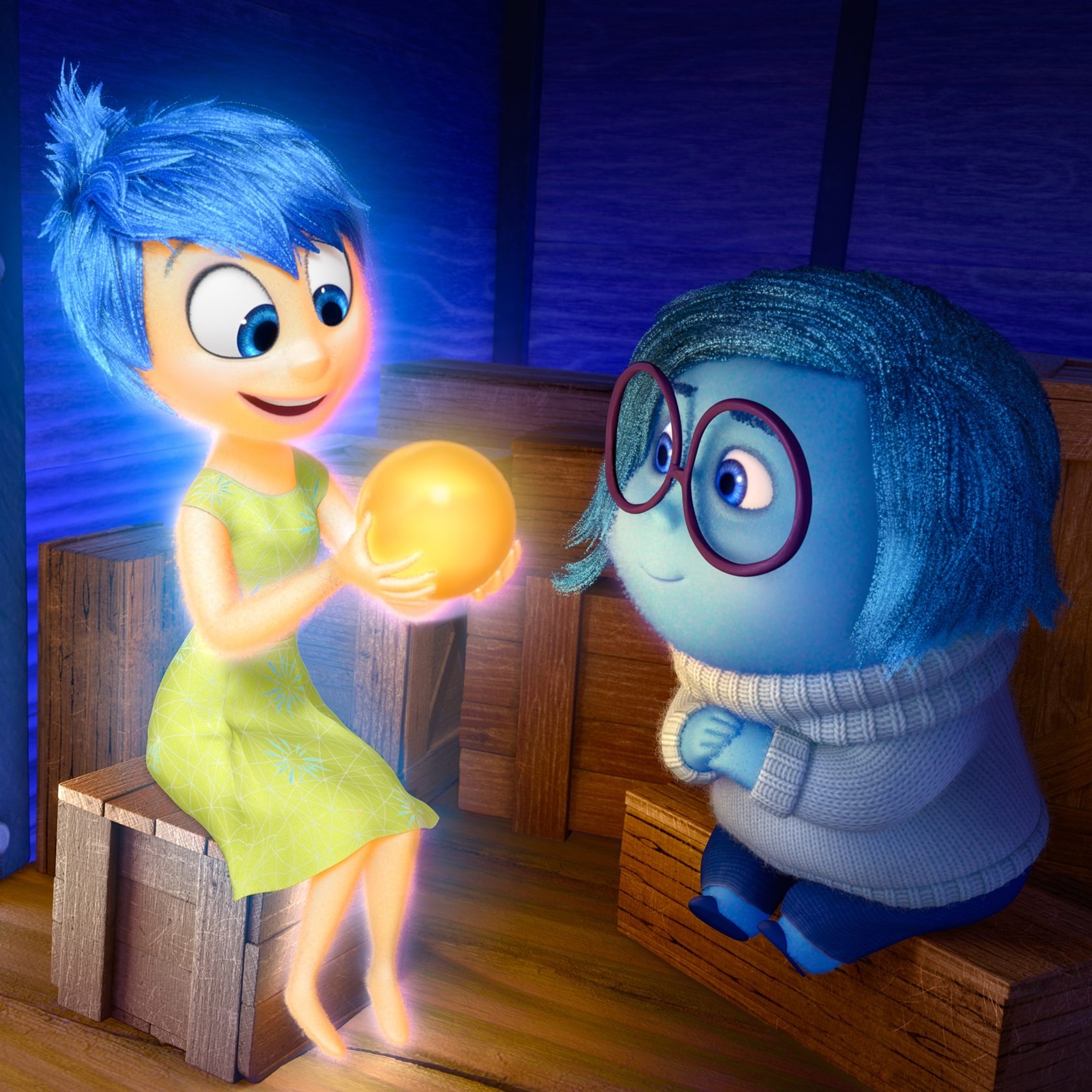 inside-out Joy (left, voiced by Amy Poehler) and Sadness (voiced by Phyllis Smith) catch a ride on the Train of Thought in Pixar's <em>Inside Out.</em> The movie opens in theaters nationwide June 19.